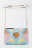 Geometric Patchwork Vegan Leather Convertible Clutch